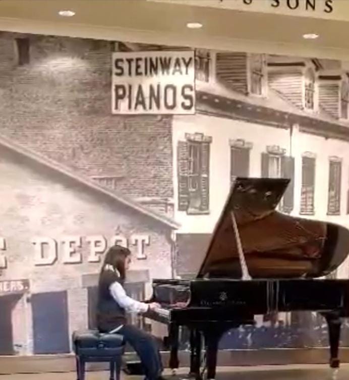 A person playing a piano