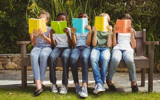 students reading a book